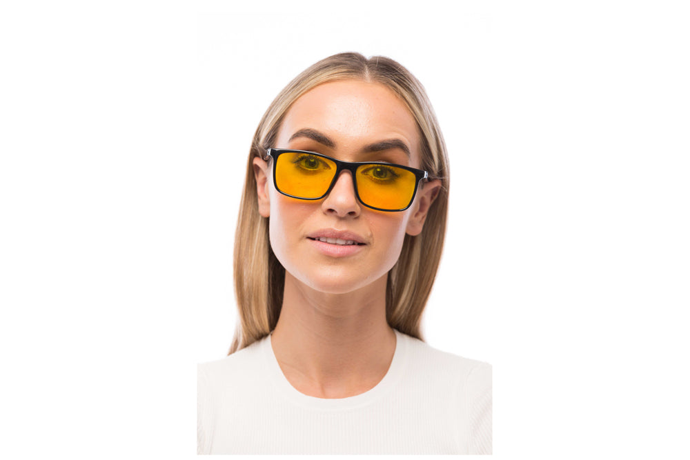 Woman Wearing Brooklyn Light Sensitivity Glasses